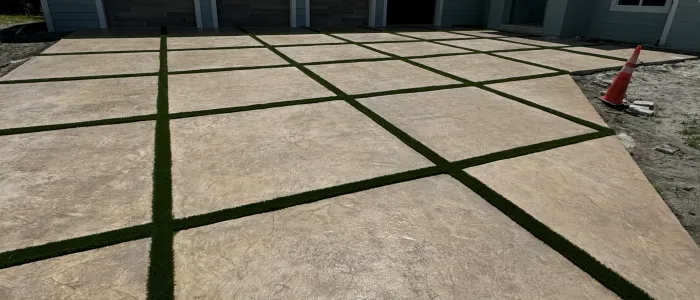 Stamped concrete walkway with stone pattern